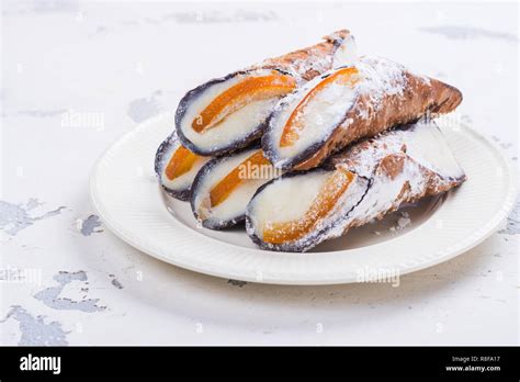 Traditional italian dessert cannoli Stock Photo - Alamy