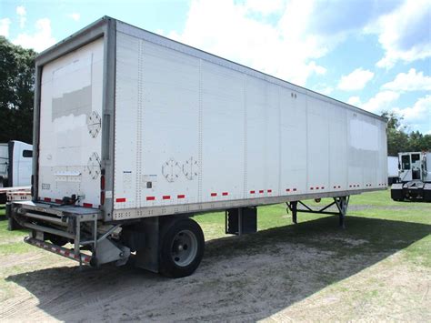 wabash  ft dry van trailer roll  door spring single axle