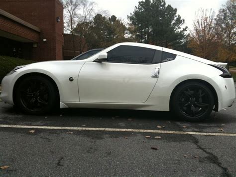 Nissan 370z white with black rims