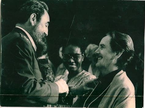 Fidel Castro awards Australian Communist Freda Brown with the Anna Betancourt Medal, 1985. : r ...