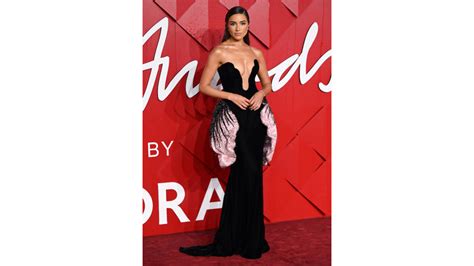 Olivia Culpo Stuns in a Plunging Black Gown on the Fashion Awards Red ...