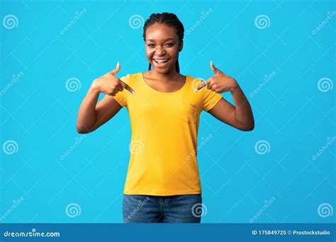 African American Girl Pointing Fingers At Herself On Blue Background