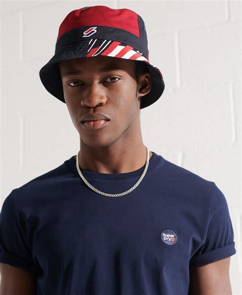 Mens Sportstyle All Over Print Bucket Hat In Tricolour Superdry