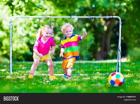 Kids Playing Football Image & Photo (Free Trial) | Bigstock