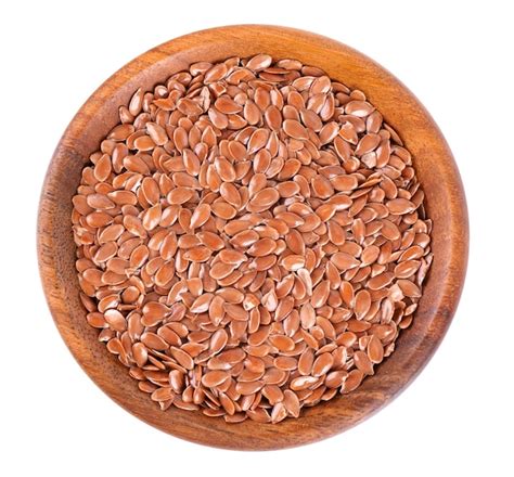 Premium Photo Brown Flax Seeds In Wooden Bowl Isolated On White