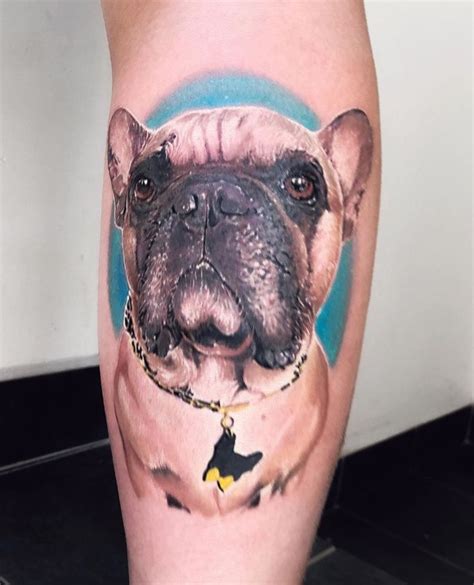 A Dog With A Chain Around Its Neck Is Shown On This Leg Tattoo