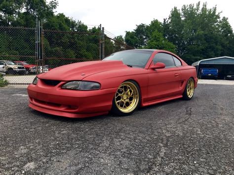 Red Car with Gold Rims | Ford Mustang Cobra