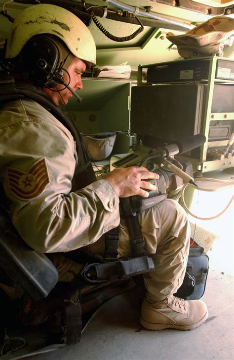 US Army USA Sergeant SGT James Carney Prepares To Dismount A M2A3