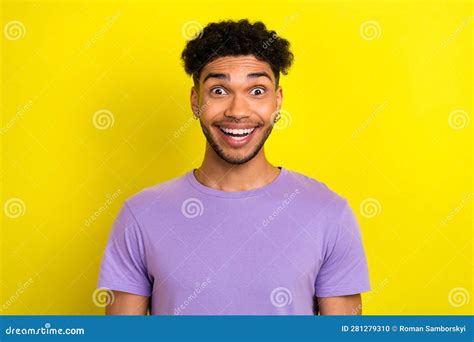 Photo Of Cheerful Excited Man Wear Violet T Shirt Open Mouth Big Eyes Isolated Yellow Color