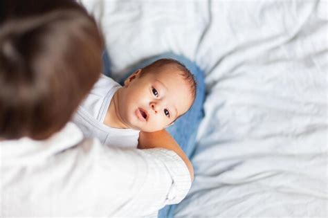 Premium Photo Directly Above Shot Of Mother Playing With Baby At Home