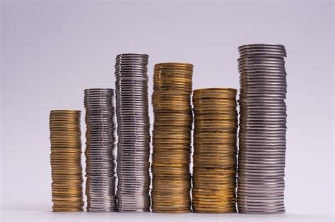 Premium Photo | Pile of coins isolated on a white background banking ...