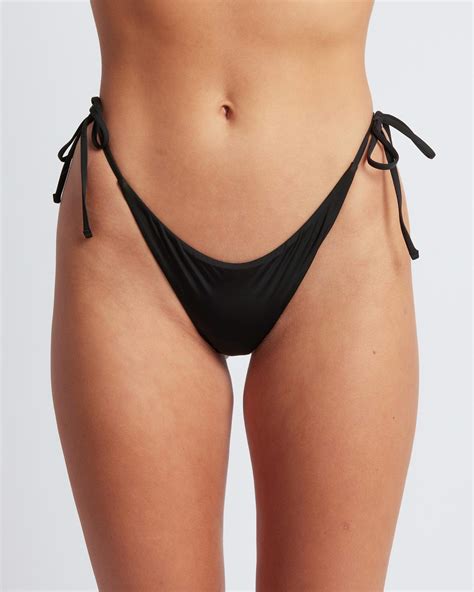 Shop Billabong Sol Searcher Tie Side Bikini Bottom In Black Pebble