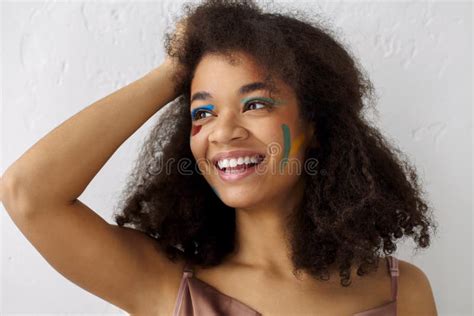 Happy African American Young Woman With Color Smears On Face Creative