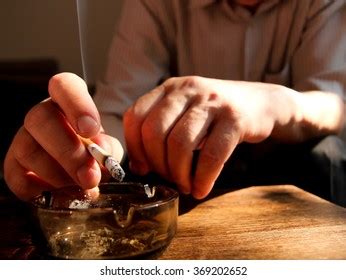 Hand Putting Cigarette On Ashtray Stock Photo Shutterstock