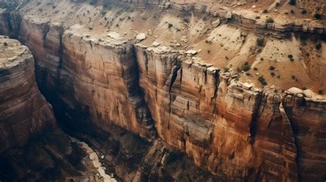 Premium Photo A Topdown View Of A Canyons Steep Walls Revealing The