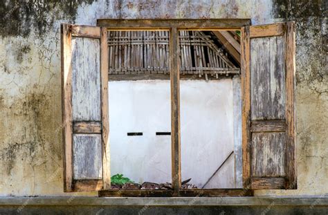 Premium Photo | Old broken wooden window in yogyakarta, indonesia