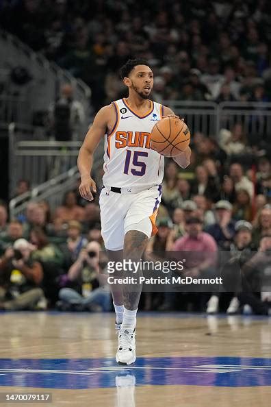 Cameron Payne Of The Phoenix Suns Dribbles The Ball Against The News