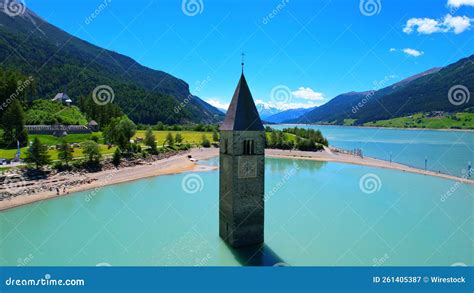 Church Tower in Lake Reschen - South Tyrol - Italy - 4k Drone Photo Stock Image - Image of ...