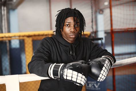 A Man In Black Sweatshirt Wearing Boxing Gloves Photos By Canva