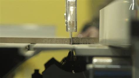 Close Up Of Cnc Milling Machine While Carving A Wooden Lumber In A