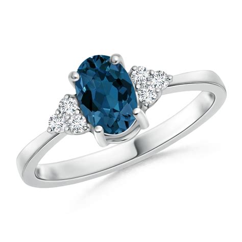 Solitaire Oval London Blue Topaz And Diamond Promise Ring Angara