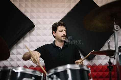 Male Performer Recording Music while Playing on Drum Set Stock Photo ...