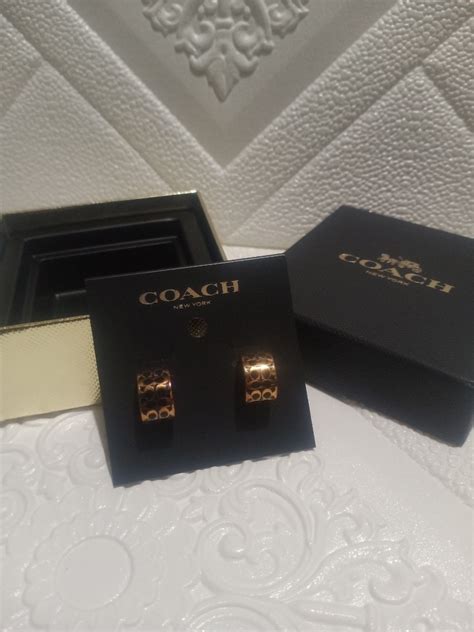 Authentic Coach Signature Huggie Earrings Women S Fashion Watches