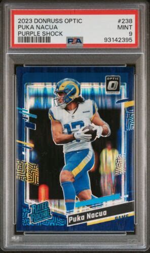 Puka Nacua 2023 Donruss Optic Purple Shock Prizm Rated Rookie PSA 9