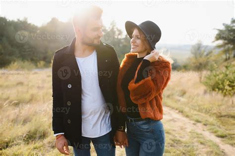 Photo Of Affectionate Bonding Couple Hug Cuddle In Autumn September