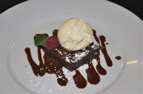 Gluten Free Chocolate Brownie With Vanilla Ice Cream And Chocolate