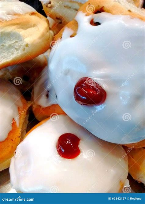 Christmas iced cherry buns stock image. Image of tasty - 62342167