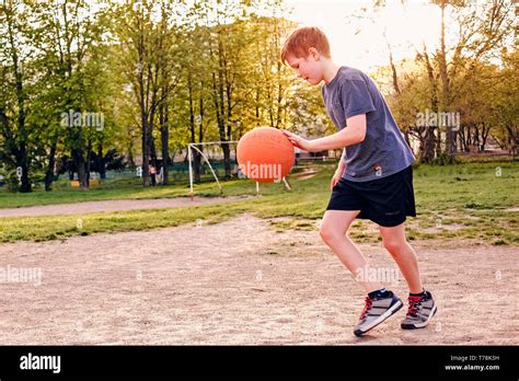 Boy Bouncing Ball Hi Res Stock Photography And Images Alamy