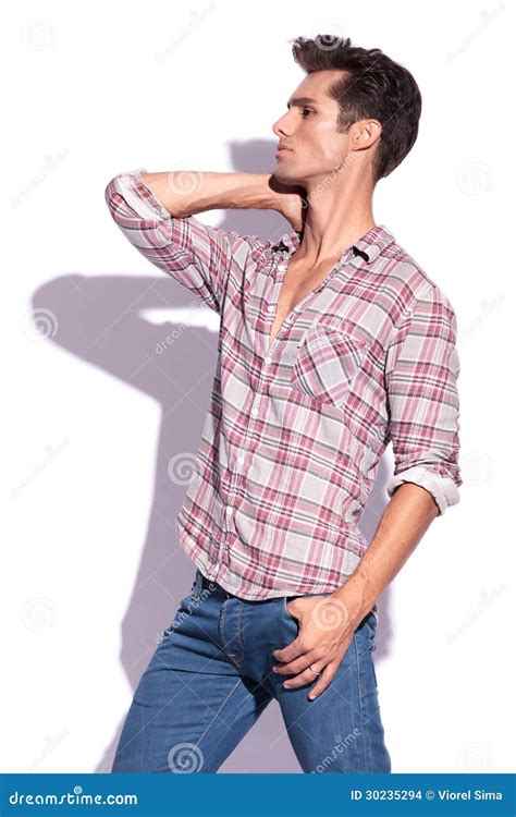 Man Poses with Hand on Neck Stock Photo - Image of finger, look: 30235294