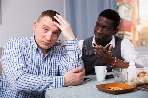 African Man Soothing Offended Friend Stock Image Image Of Sitting