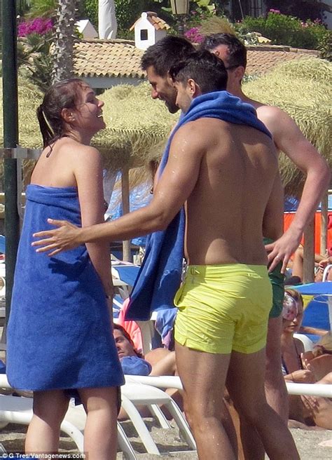 Novak Djokovic Goes Topless As He And Wife Jelena Hit The Beach In