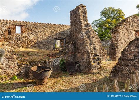 Stone Wall Of A Ruined Building In The Martyr Village Of Oradour Sur