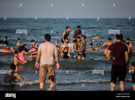 (190801) -- RAMSAR, Aug. 1, 2019 (Xinhua) -- Locals enjoy their leisure ...