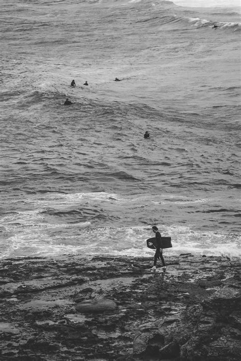 Person Walking On Beach · Free Stock Photo