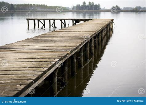 Dock on a lake stock image. Image of pots, lake, plant - 27811099