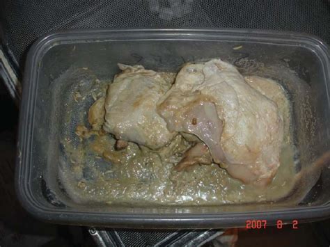 A Ziploc Container And Conditioned Chicken Thighs Used To Rear