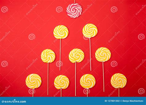 Sweet Caramel Candy On A Red Background Stock Photo Image Of