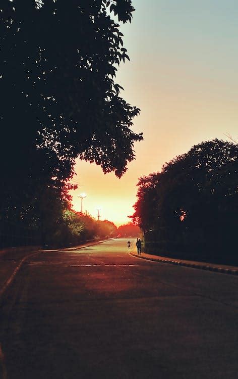 Empty Asphalt Road at Sunset · Free Stock Photo