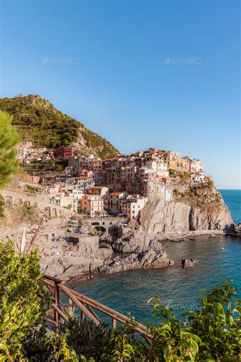 Manarola A Coastal Town In Italy Showcasing The Colorful Houses That Line The Steep Hillsides