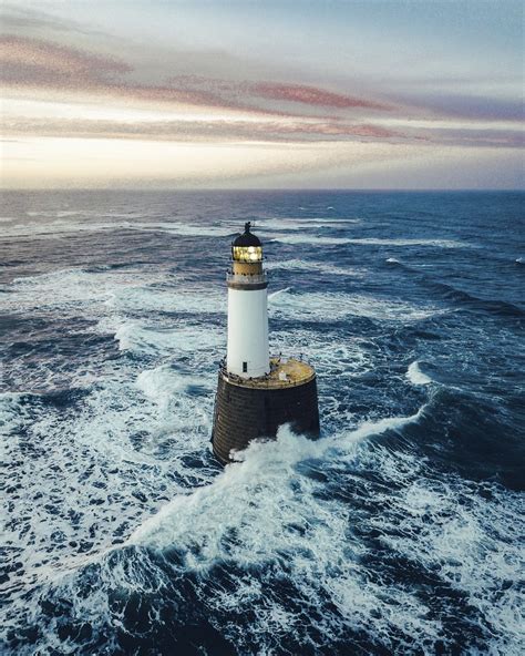 Waves Hitting Lighthouse Scotland Premium Photo Rawpixel