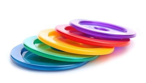 Premium Photo Set Of Colorful Frisbees On White Background