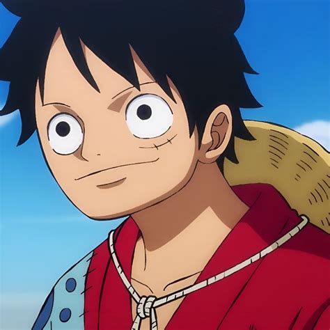 An Anime Character With Black Hair And Big Eyes Looking At The Camera