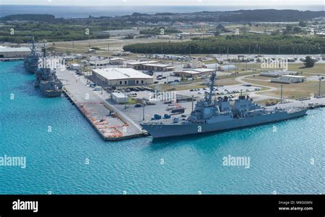 An aerial view of U.S. Naval Base Guam shows several Navy vessels ...