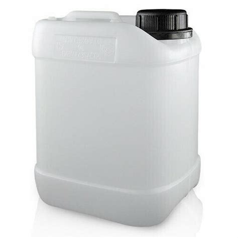 A White Plastic Jug With A Black Cap On The Top Is Shown In Front Of A