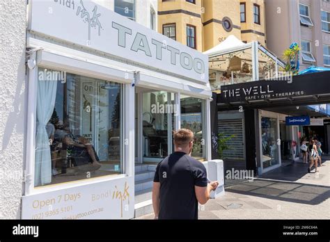 Bondi Beach Ink Tattoo Shop Store With People Having Tattoos Applied To