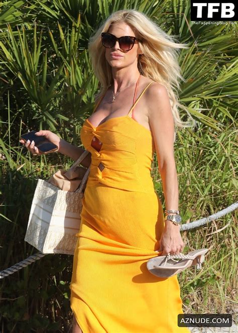Victoria Silvstedt Lounges Beachside In Miami In An Orange Two Piece Bikini AZNude